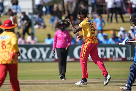 Richard Ngarava celebrates a wicket against India